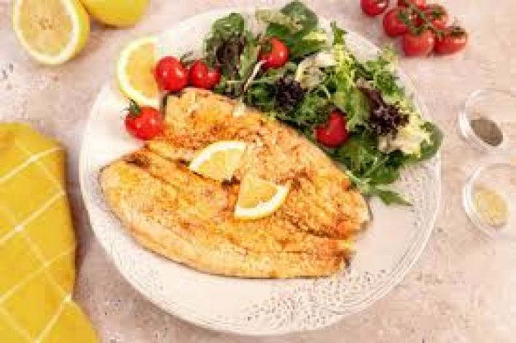 Trucha frita con arroz y sarza criolla